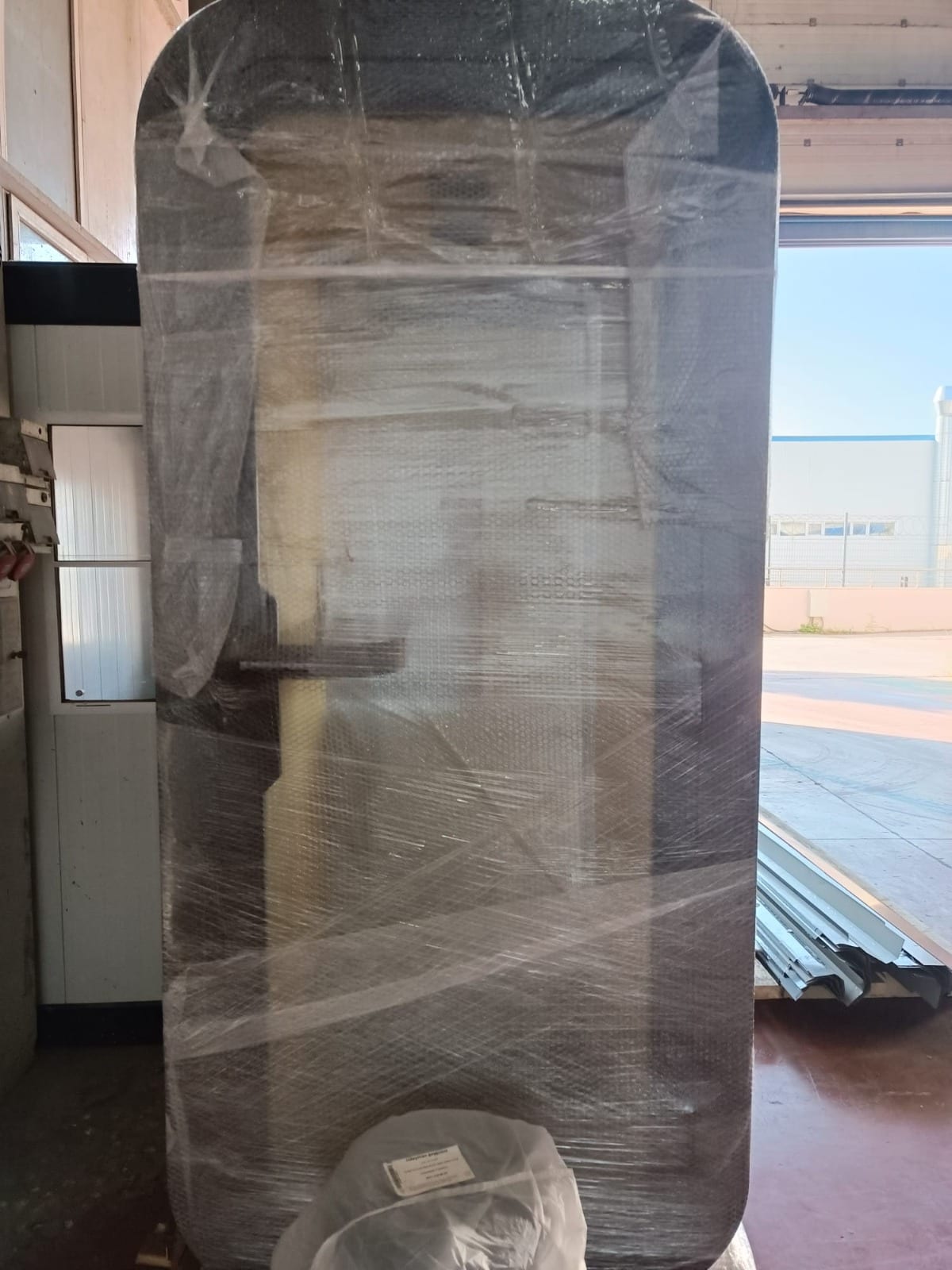 Pod wrapped in protective film ready for delivery